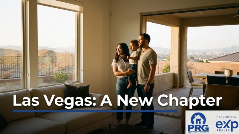 Family of three, parents holding a child, looking out a large window at a Las Vegas desert landscape.