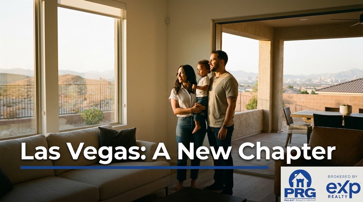 Family of three, parents holding a child, looking out a large window at a Las Vegas desert landscape.